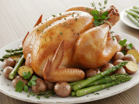 Photorealistic Golden Roasted Chicken With Potatoes and Asparagus.jpeg